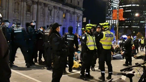 Police arresting activists Stock Footage 120060423