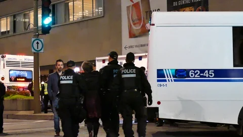 Police arresting activists at night Stock Footage 120061344