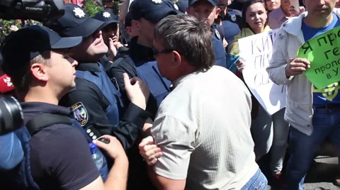 Police attack protesters Stock Footage 64118285