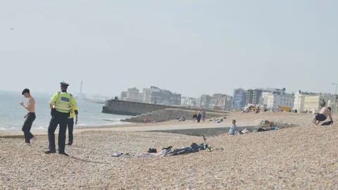 Police on the beach 10 Stock Footage 130080698