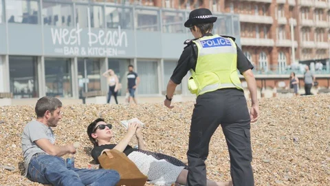 Police on the beach 2 Stock-Footage 130053056