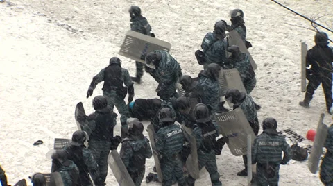 Police beating and arresting protesters doctors Stock Footage 34321793