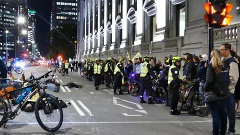 Police blocking public on the sidewalk Stock Footage 120061547