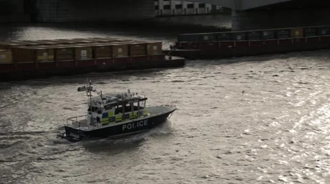 Police Boat passes through River Thames London (B-Roll/Cutaway/GV) | HD 1080 Stock Footage 47204601