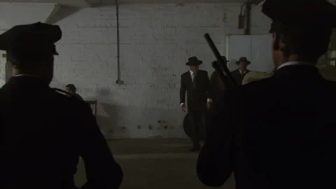 Police breaking up bootlegging operation, 1929 - Reenactment Stock Footage 202899537