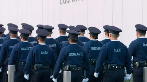 Police cadets marching outside LAPD headquarters in Downtown LA 4K Video stock 62272014