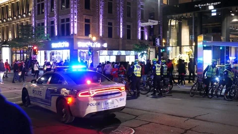 Police car blocking street during celebration Stock Footage 114797104