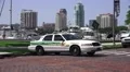 Police Car On Brick Road Tampa Bay Marina And City Skyline HD HD Footage