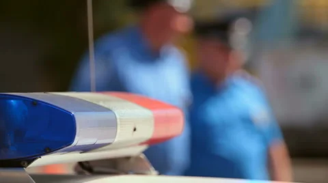 Police car on city road Stock Footage