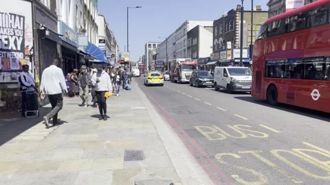 Police Car Driving Through Dalston Kingsland 库存影片 242530989