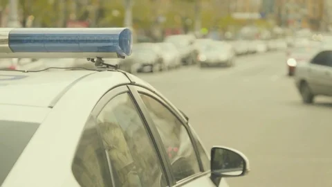 Police car with flasher on the road Stock Footage