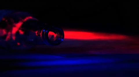 Police Car Lights with Beer Bottle Stock Footage 49480053