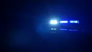 Police Car Lights, Blue  And White In The Dark Stock Footage