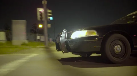 Police car night drive exterior through suburbs. Stock Footage