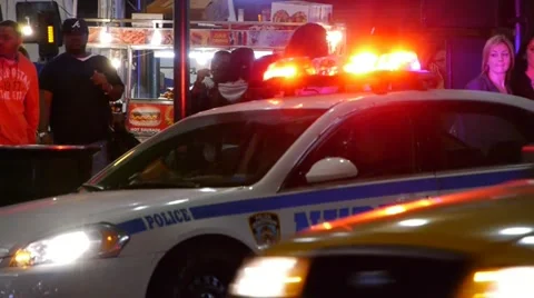 Police Car at night NYPD New York City patrol cop 911 Stock Footage