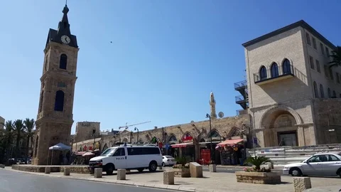 Police car parked at Jaffa clock tower, Muazin audio, street, cars, old city Vídeos de archivo 80731609