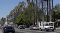 Police Car Passing Sunset Boulevard Los Angeles Rush Hour Busy Traffic LA Street HD Footage