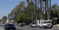 Police Car Passing Sunset Boulevard Los Angeles Rush Hour Busy Traffic LA Street 4k or 4k+ Resolution