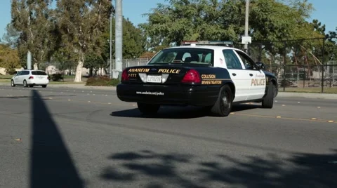 Police Car Pulling Out into Traffic Stock-Footage 59165631
