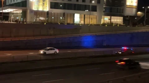 Police Car speeding down Highway  Stock Footage 220534622