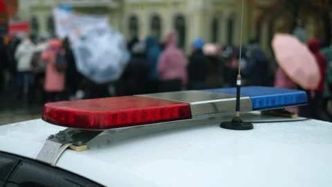 Police car strobe flashers. Red blue light bar on officer vehicle. Civil unrest. Stock Footage 154539839