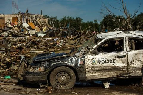 A police car was destroyed by a tornado May 22, 2013, in Moore, Okla. The ... Stock Photos