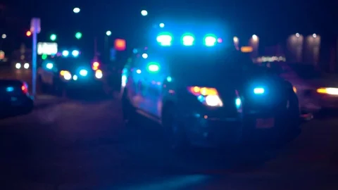Police Cars Parked With Red And Blue Emergency Lights Strobing At Night Stock Footage