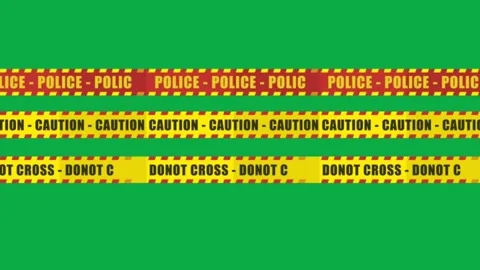 Police caution do not cross barrier tape lines moving on green screen background Stock Footage 332282504