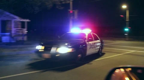 Police chase with fugitive car driving near camera Stock Footage