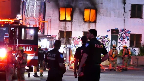 Police chatting at criminal fire Stock Footage 116010758