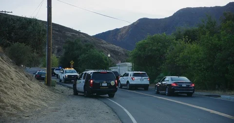Police checkpoint for security to enter Malibu area in Los Angeles, California Stock Footage 98551072