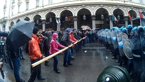 Police clashes and demonstrators in the May Day procession Stock Footage 88965572