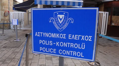 Police control checkpoint crossing North South Nicosia, Cyprus' divided capital Stock Footage 237516438