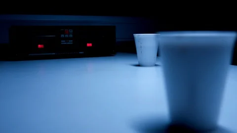 Police Custody Interrogation Interview Room - Rack Focus to Coffee Cup Stock Footage 114795591
