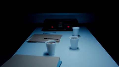 Police Custody Interrogation Interview Room - Track Bacl Along Table Stock Footage 114796109