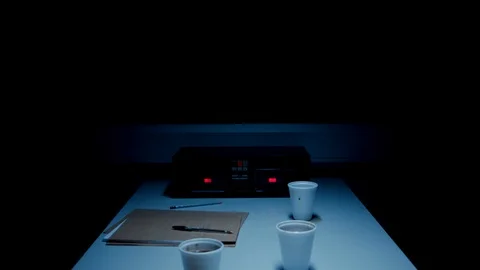 Police Custody Interrogation Interview Room - Track Back From Tape Recorder Stock Footage 114796116