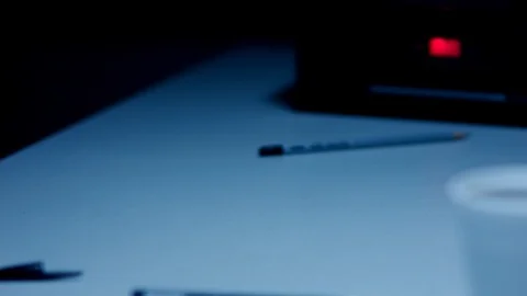 Police Custody Interrogation Interview Room - Detective Shuffles Documents 動画素材 114796852