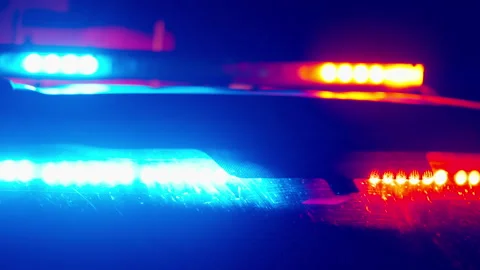 Police emergency lights close up flashing night abstract blur Video stock 342579367