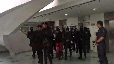 Police escorting the accused. Stock Footage 115958515