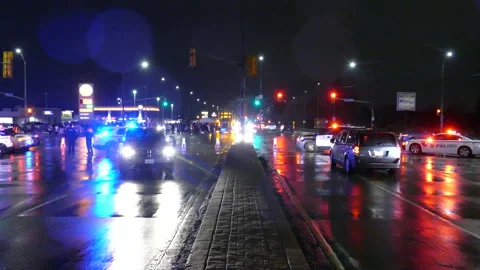 Police escorting Freedom convoy in Windsor in Ontario, Canada. 스톡 동영상 233783773