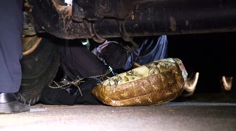 Police extracting Protestor chained to vehicle Stock Footage 47483909