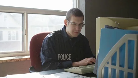 Police filing reports for crimes Stock Footage 72971812