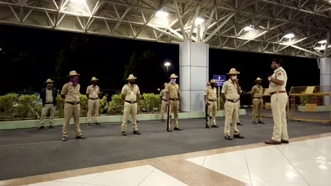 Police force during a briefing  of Lockdown rules in Mysuru, India. Stock Footage 154040261