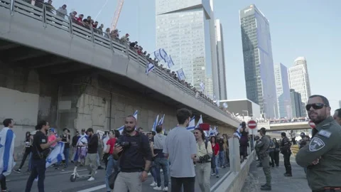 Police forces face protesters blocking main highway during violent protest Stock Footage 236206311