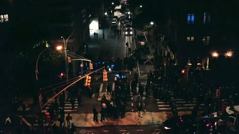 Police form barricade for protestors - flyover in New York City NYC Stock Footage