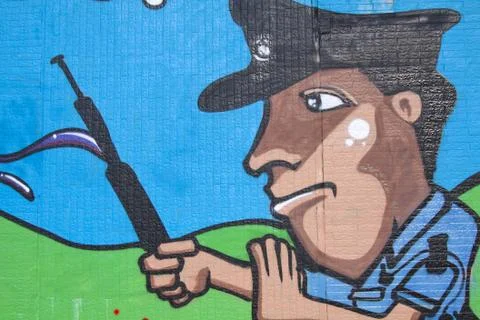 Police graphc on wall Stock Photos