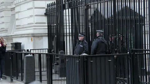 Police Guard Downing St Video stock 24387132
