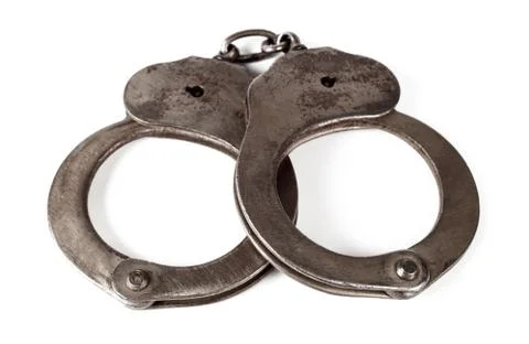 Police handcuffs on a white background, isolate, close-up Foto stock
