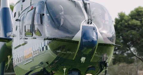 Police helicopter rotating into position to fly out on police operation. Stock Footage 88452059