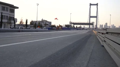 Police highway patrol before bosphorus bridge and traffic Stock Footage 170909341